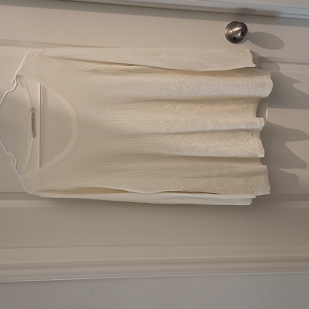 White/cream colored lightweight sweater.  Great for spring temps.